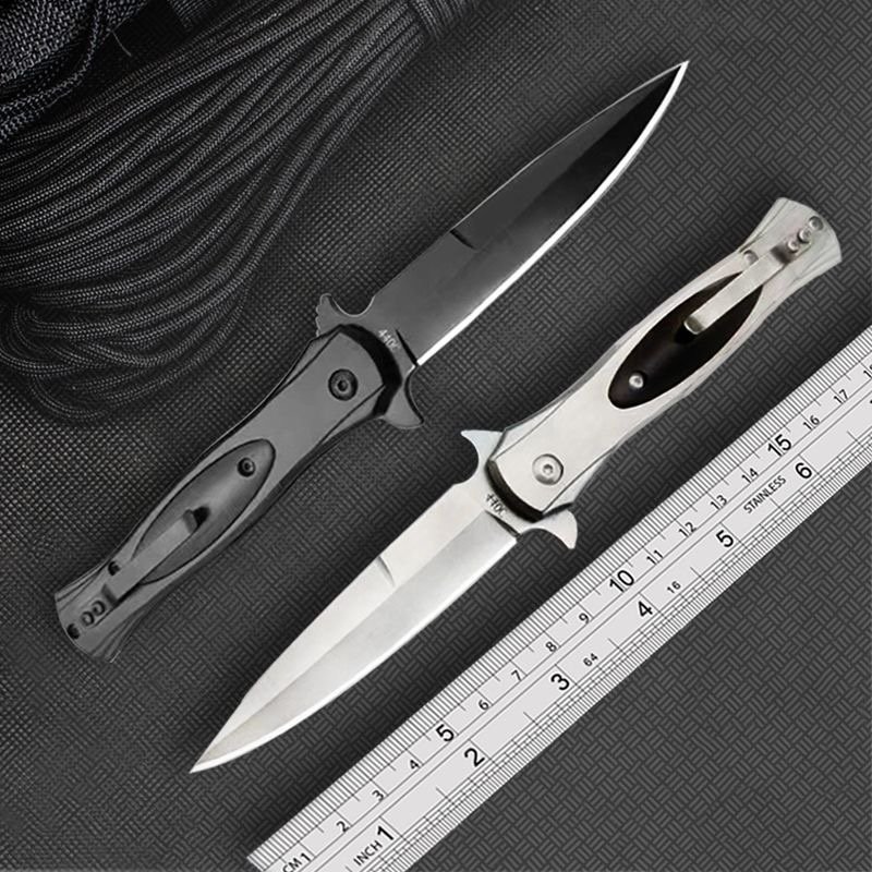 The exterior defensive military knife, the camping knife, folded with the fruit knife and the special forces