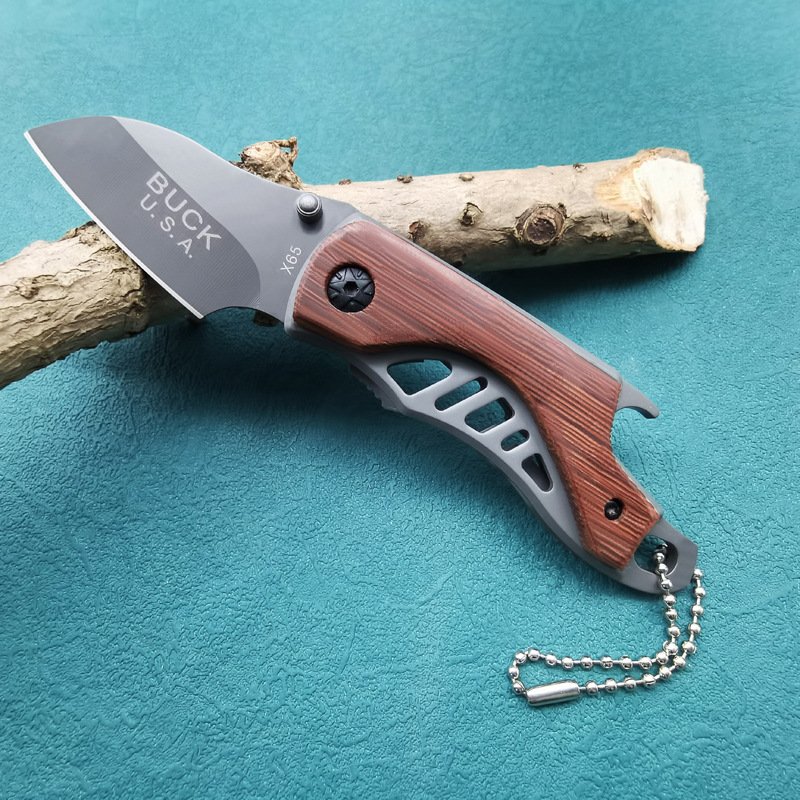 A multi-purpose folder with a high-level mini-fruit knife and a field cutter