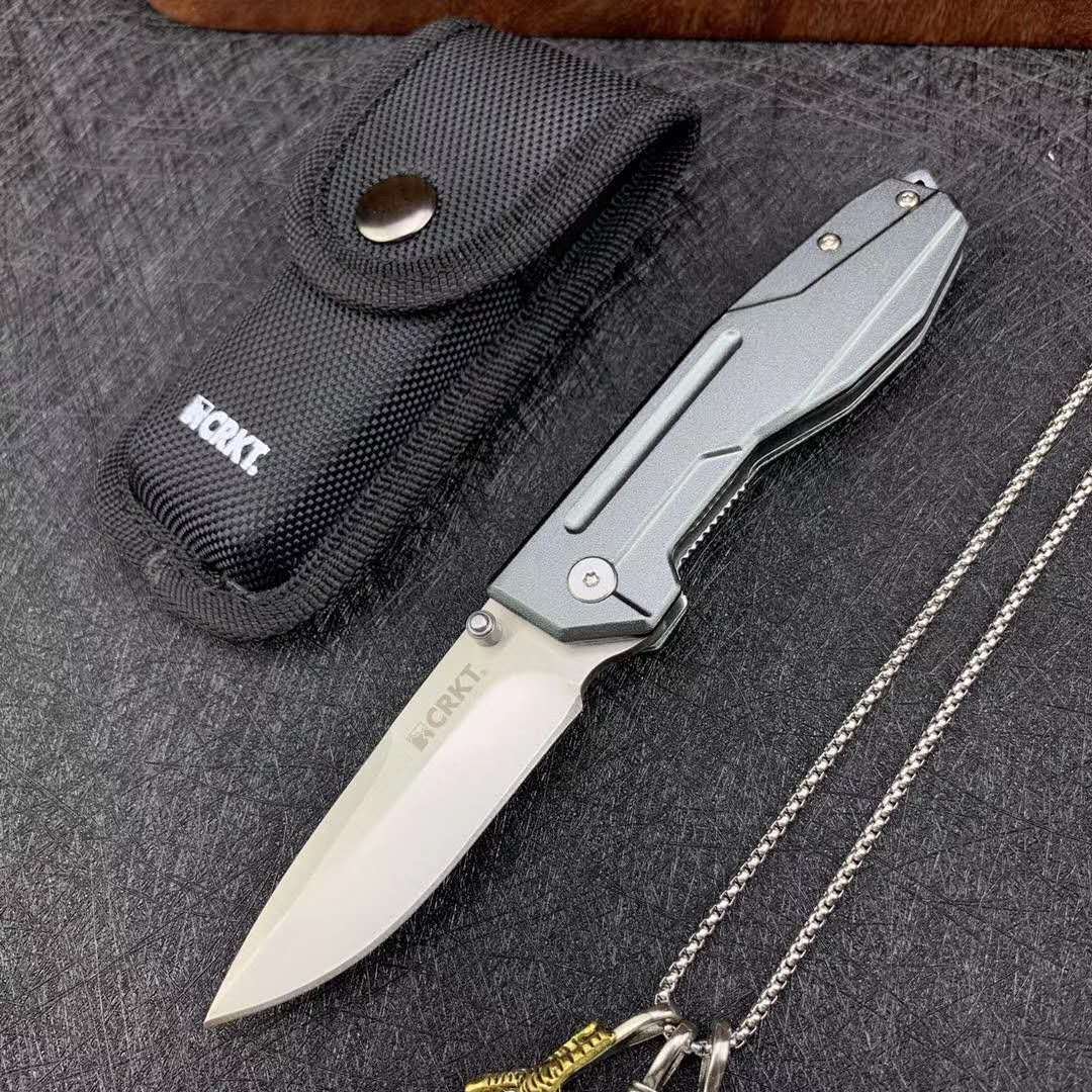 FOREIGN TRADE HEATER CRKT 2142 CAMP KNIFE WITH A HARD KNIFE OUTSIDE THE HOUSE WITH EDC FOLDING KNIFE