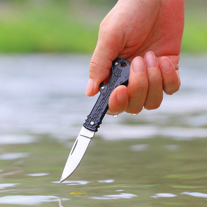 An outdoor knife with a folding knife and a multi-purpose outdoor key to the bottle opener, camping