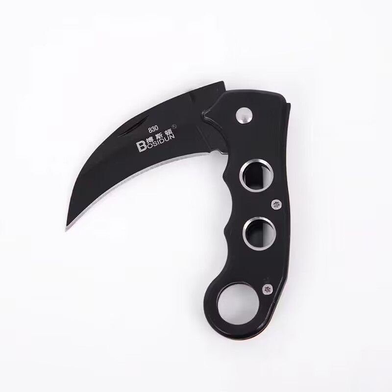 The camping knife is so hard that it folds key and fruit in the field with the claw knife