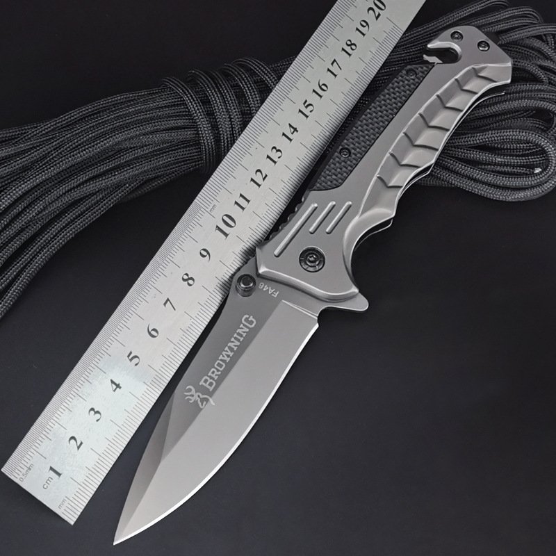 A multi-purpose knife folded with a fruit knife and a mash knife