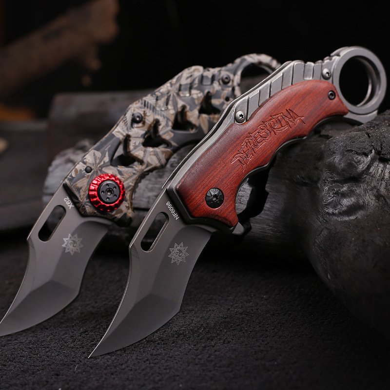 An outdoor cleaver, a tactical knife, a high-hard field for survival