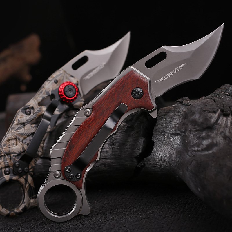 An outdoor cleaver, a tactical knife, a high-hard field for survival