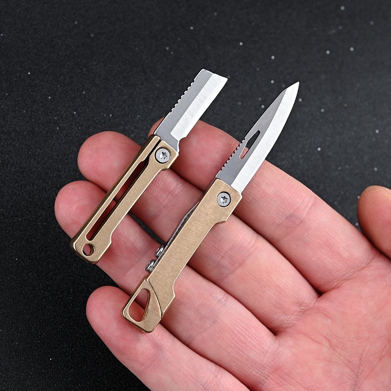 A pocket knife, a brass little knife, a walled-up piece of knife, with a handy delivery key button, a tiny folding knife