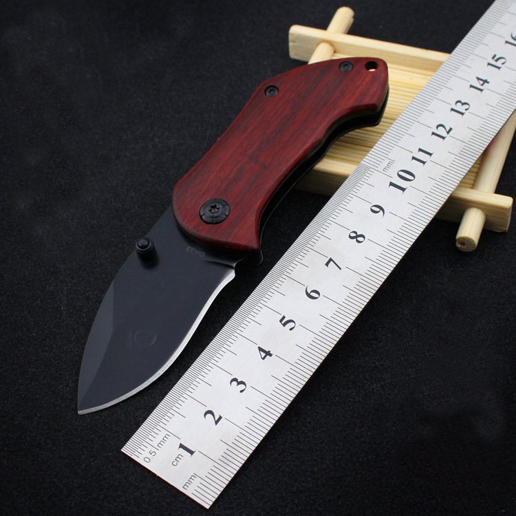 Cash-for-home camping knife and jungle tactics to fold a small knife, a ragwood handle and a traditional knife