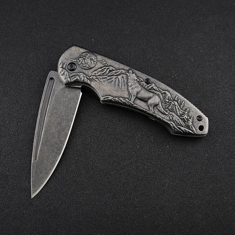 An outdoor folding knife with a sharp edge and a field camping knife