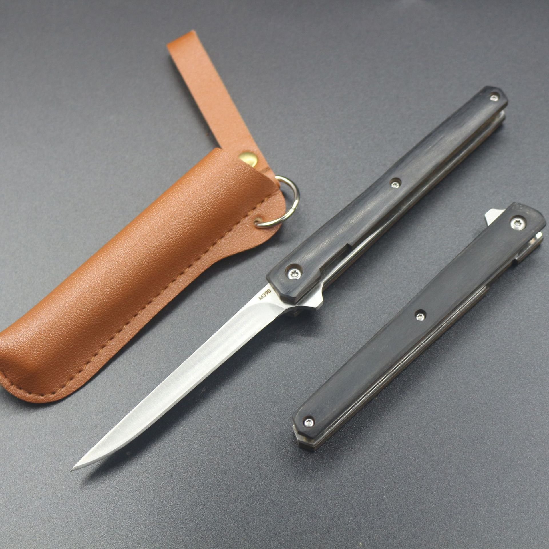 Multi-purpose outdoor camper with a folding tool and a knife with a mini-scissor