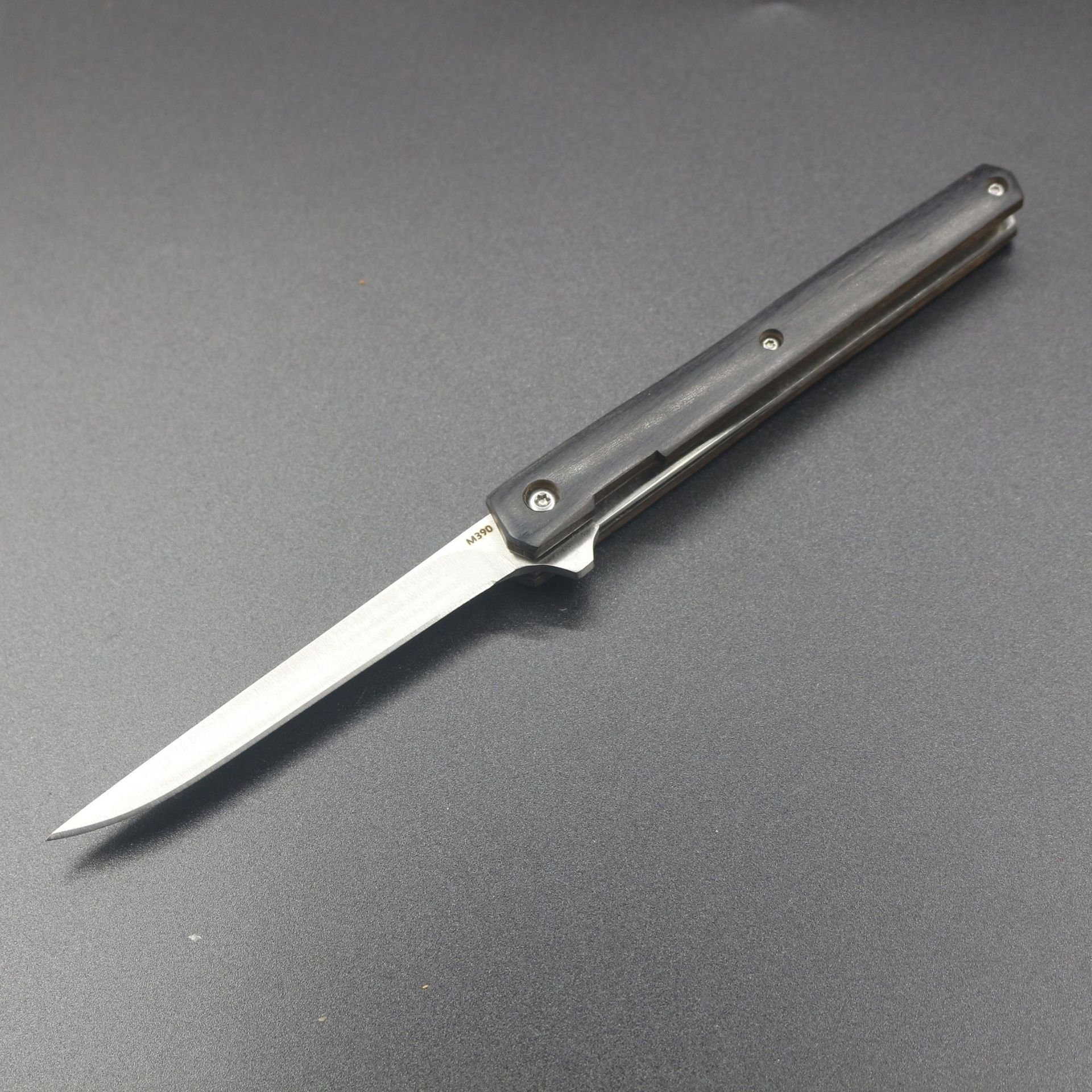Multi-purpose outdoor camper with a folding tool and a knife with a mini-scissor