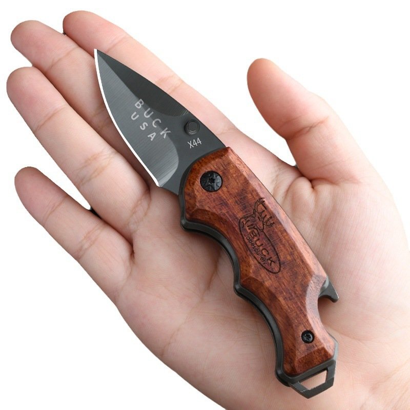 An outdoor blade with a key attached to a high-strength field for survival
