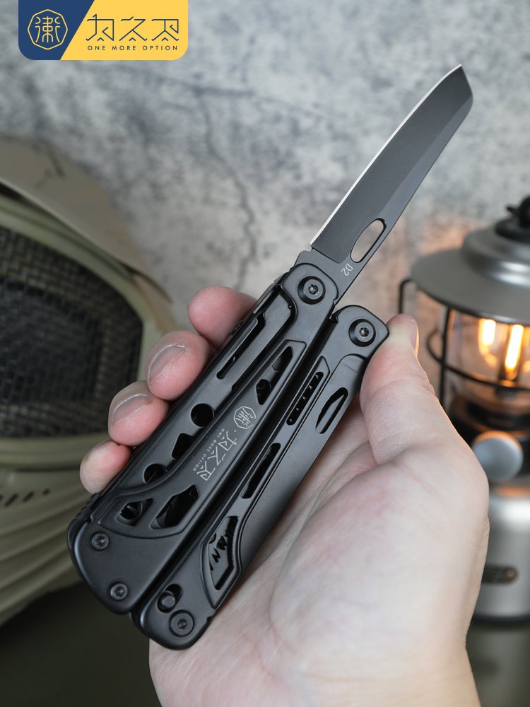 A MULTI-PURPOSE PLIER FOLDING TOOL, A D2 STEEL, BLACK SWISS ARMY KNIFE EMERGENCY EQUIPMENT TO PROTECT THE EXTERIOR