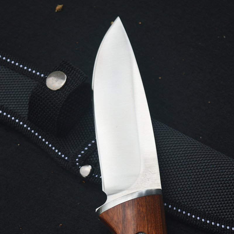A field knife with a field knife and a field knife and a knife and a knife and a meat knife