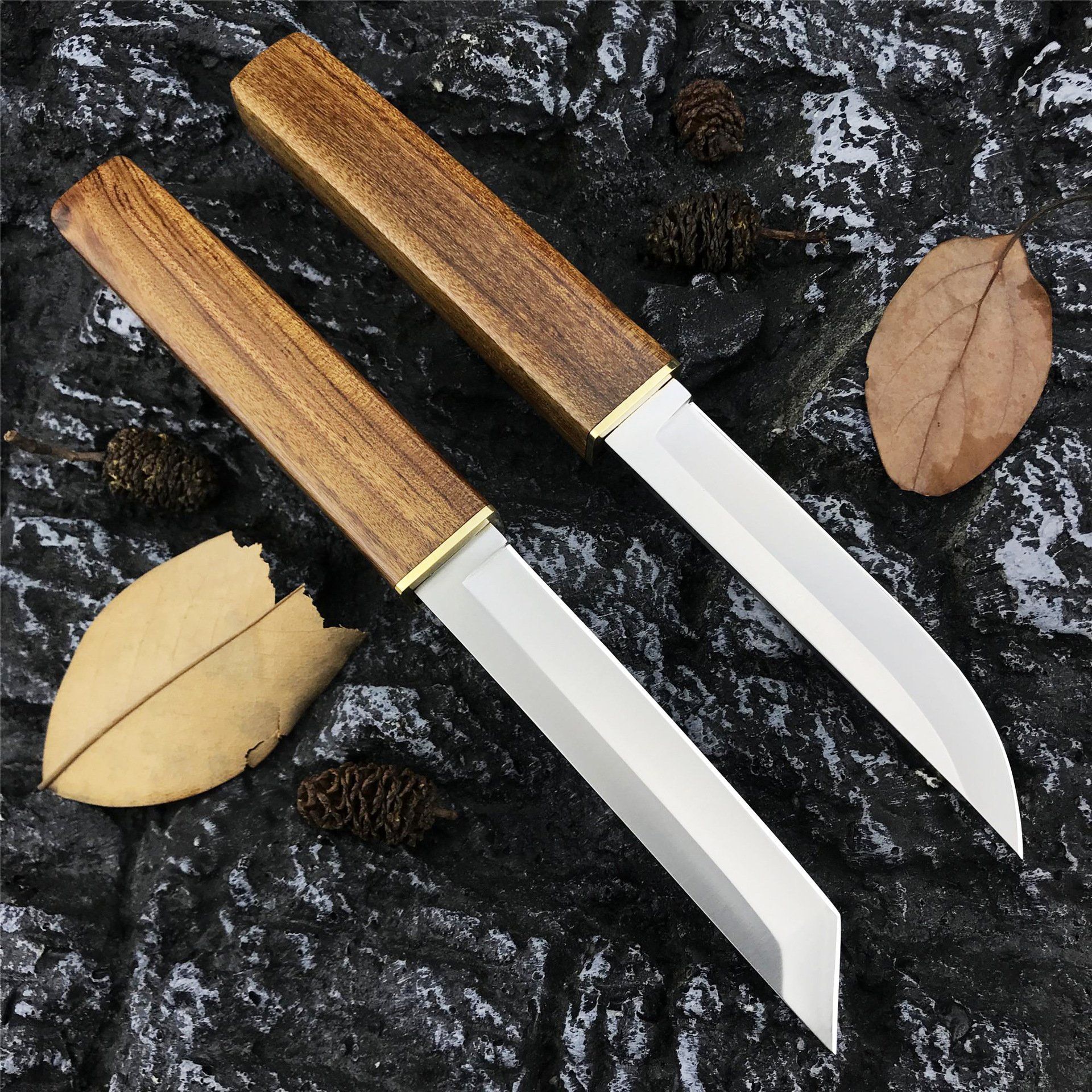 Kikida's two-knife, two-knife, two-knife, two-knife, two-knife, one-strike, and he's carrying a camp knife