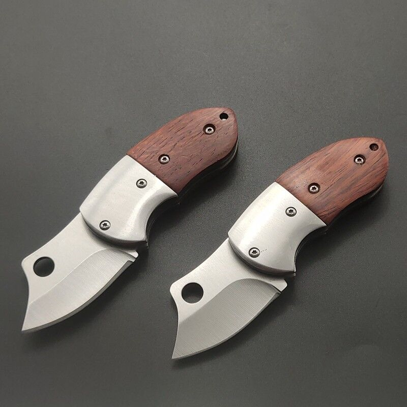 I'm going to camp with my mini knife, and I'm going to have my key knife, a redwood handle, a fruit knife