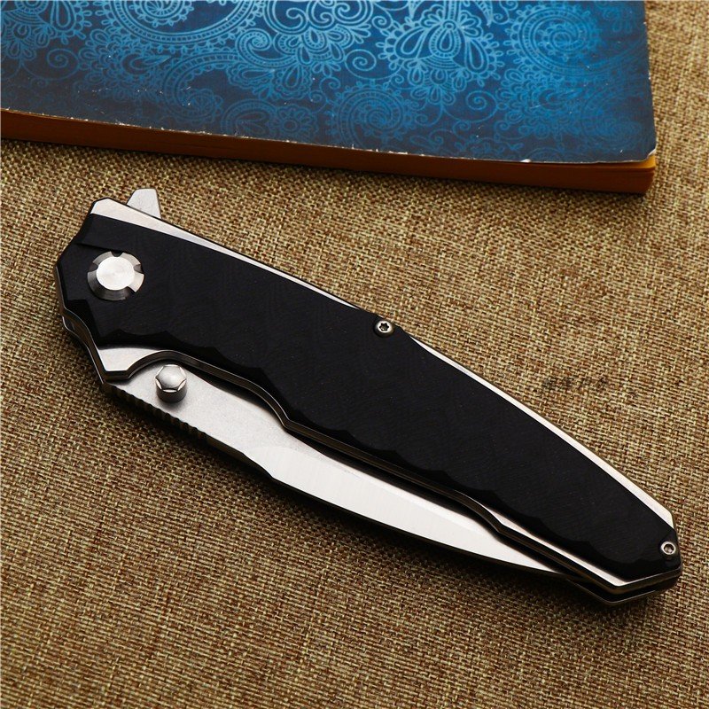 THE PYTHON DC53 STEEL FOLDER CAMPING OUTSIDE THE HOUSE WITH A HIGH-STRENGTH SHARP EDGE AND AN EDC FOR LIFE