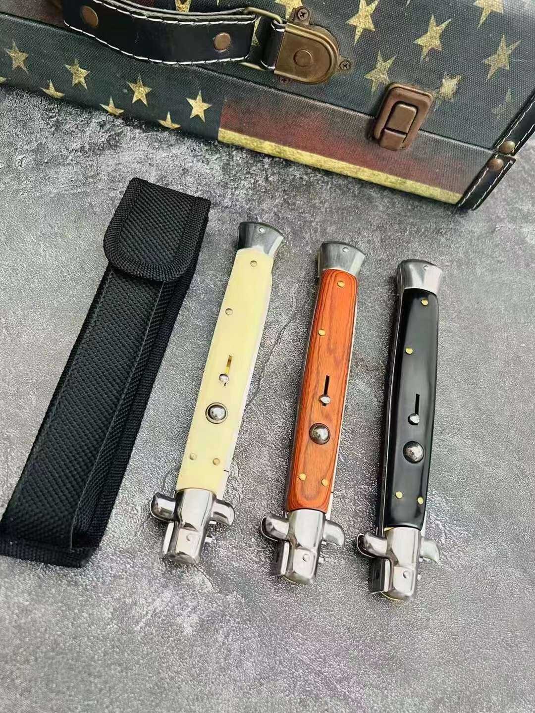 THE MAFIA HAS 13-INCH AKCS WITH A FOLDING KNIFE TO DEFEND THEMSELVES FROM THE OUTSIDE