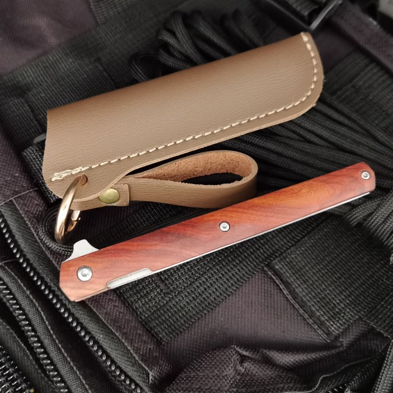 A mini knife folds out-of-the-door knife, a delivery tool