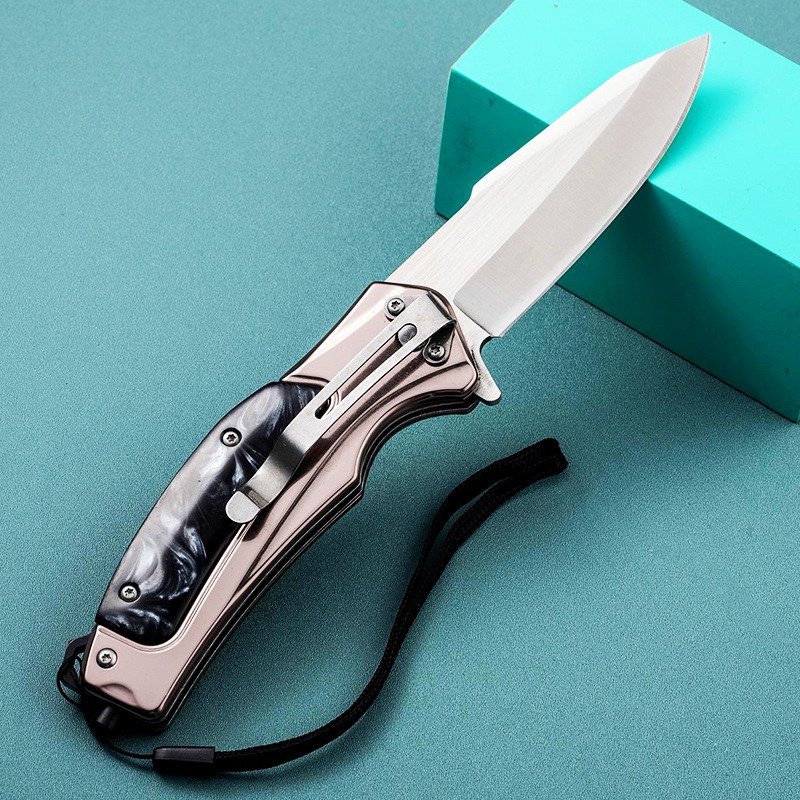 An outdoor folding knife, a high-string blade, a sharp knife, and a fruit knife with it
