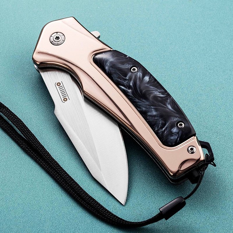 An outdoor folding knife, a high-string blade, a sharp knife, and a fruit knife with it