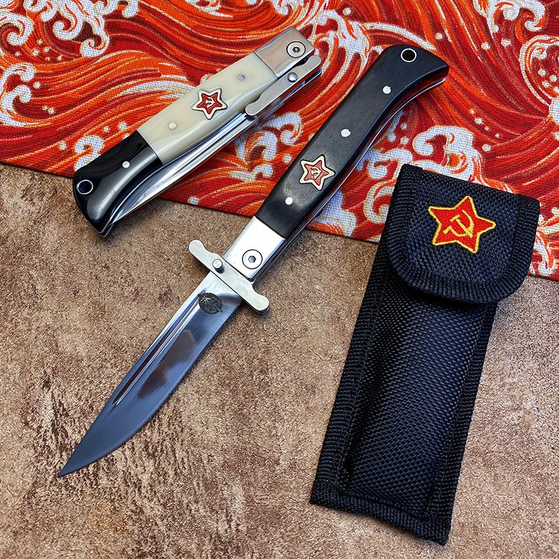 An outdoor multipurpose folding of a fruit knife and camping cooks with a meat knife and a sharp blade