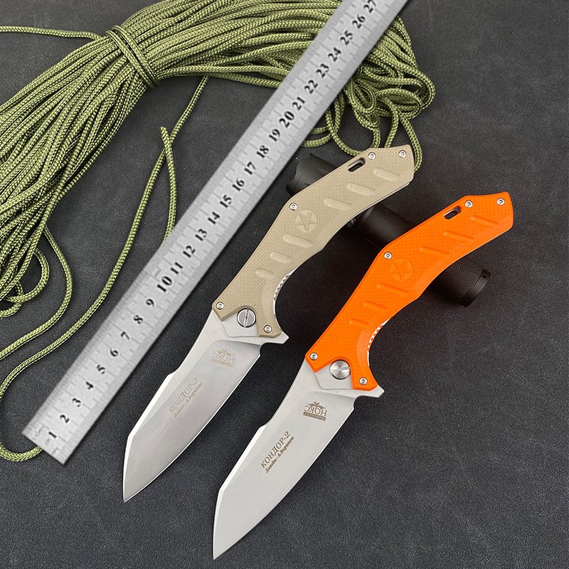 A multi-purpose folding knife, a camping knife, carries meat and fruit with him