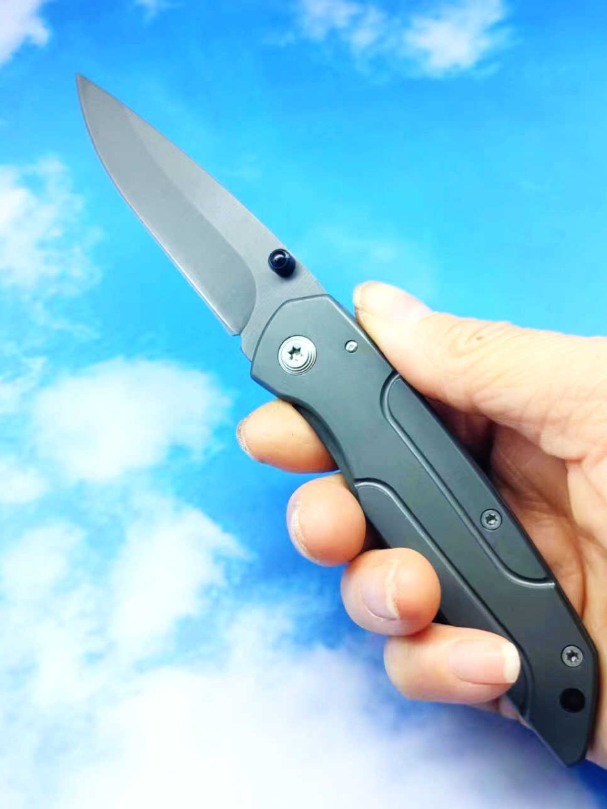 An outdoor folding knife with a high-strength sharp fruit knife and a small knife to protect the body from the knife