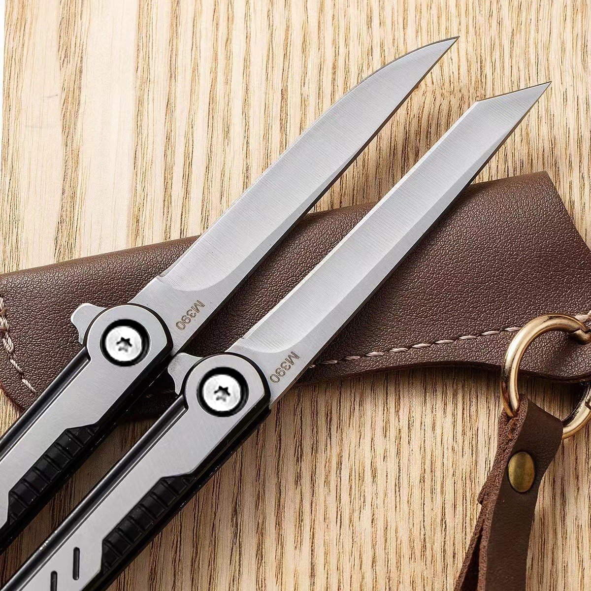 A small knife on the outside and a slashing knife on the camp