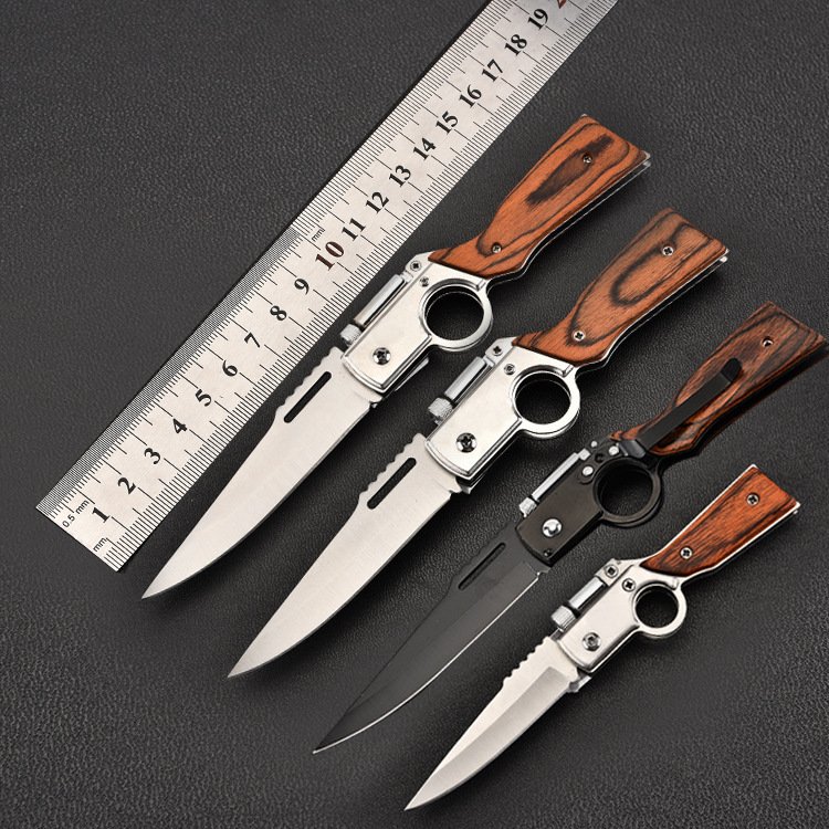 germany imported a rusty steel field knife with a k47 folding knife and a field knife to survive