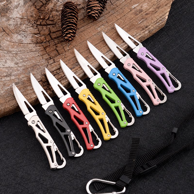 A mini-scissor multi-purpose folder, with a small knife to protect the body, and an outdoor equipment to decipher the delivery knife