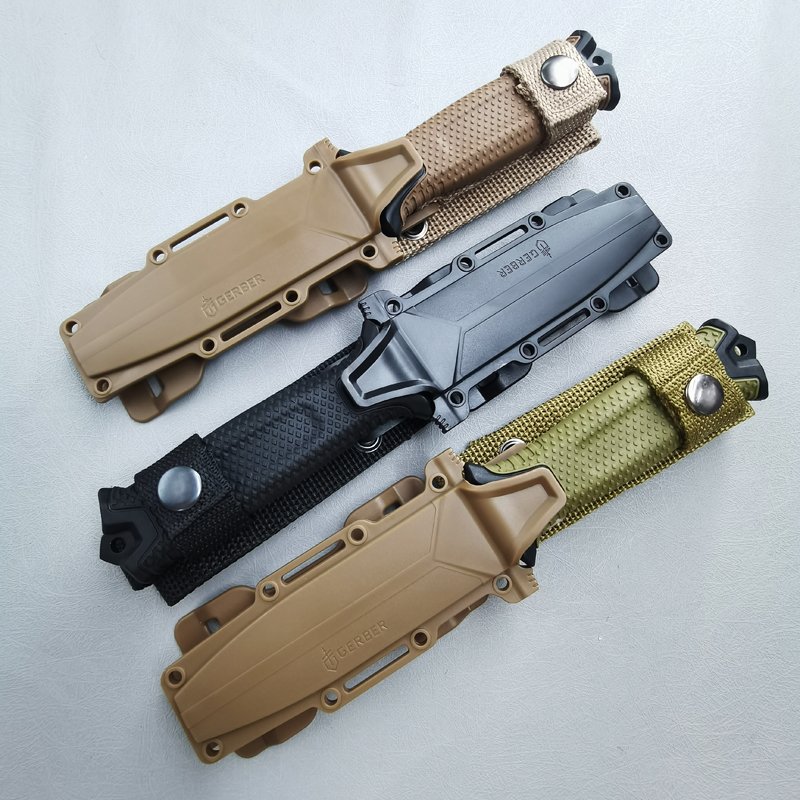 AN OPEN-DOOR EXPLORER, A SWISS TACTICAL KNIFE, BG, A CAMPING KNIFE WITH A DRAGON BLADE