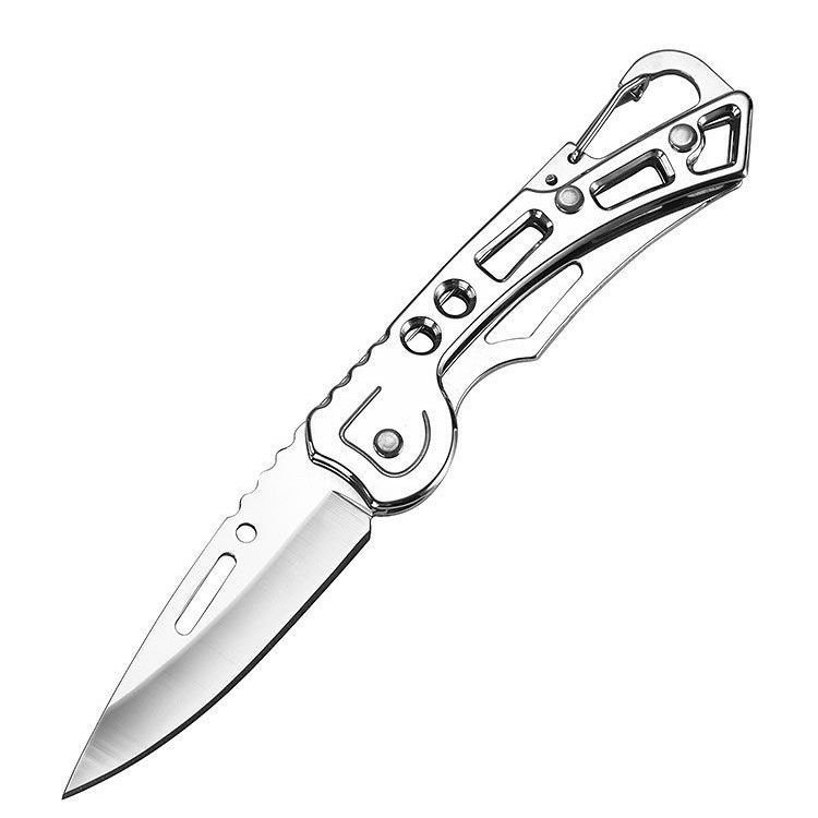 The portable fruit knife folds the key button and hand-off the box with a guacamole in his hand