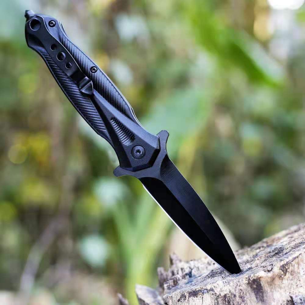 An outdoor tactical folding knife with a high-strength sharp defensive knife and a field survival equipment camping tool