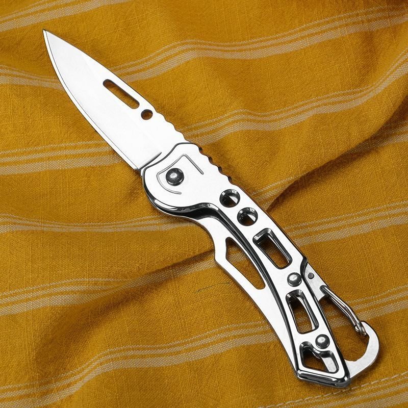 Importing a manganese steel cutter and a knitting knife and carrying a new sharp folding knife and slashing a knife with more energy