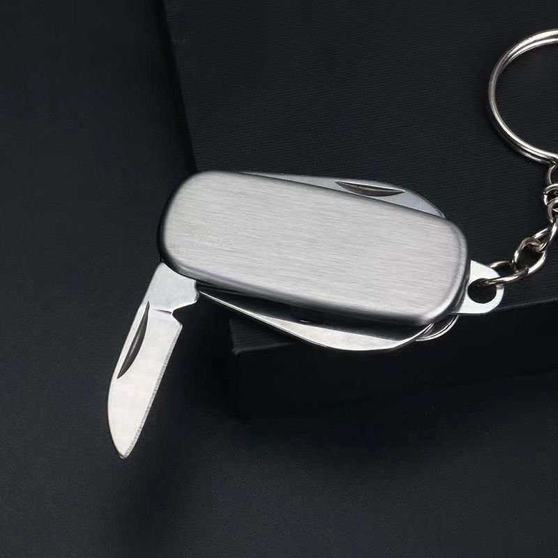 A multifunctional combination of knives and a folding of knives and a life-saving knife with a small knife and a fruit knife