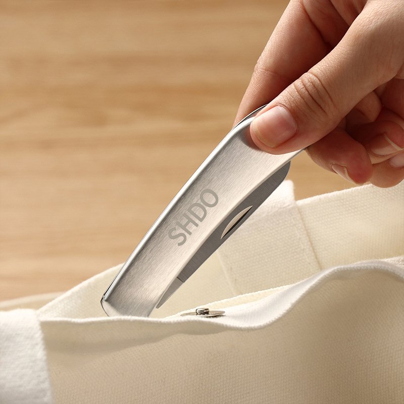 The German stainless steel folds a fruit knife with a small, sharp, hard knife outside the home