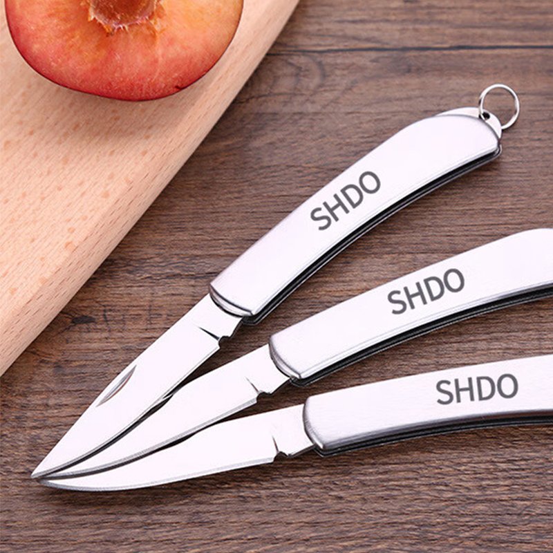 The German stainless steel folds a fruit knife with a small, sharp, hard knife outside the home