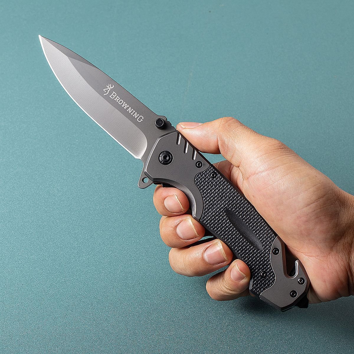 Browning folds the knife with a multi-purpose stainless steel mini-collar
