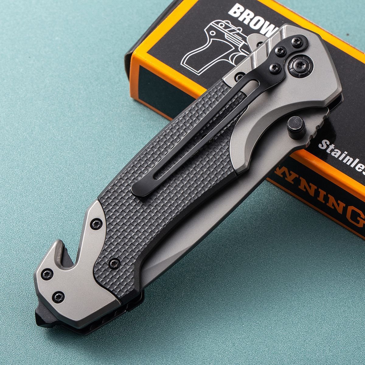 Browning folds the knife with a multi-purpose stainless steel mini-collar