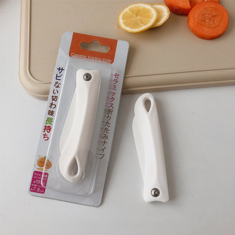 "slice the fruit no more taste" japanese pottery knife folds the fruitins outside, camping with white sidekicks