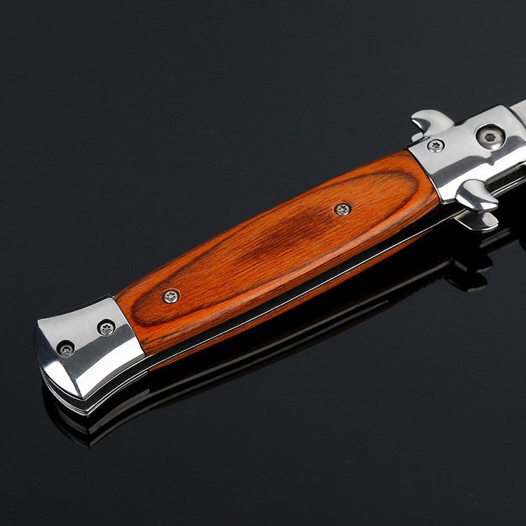 A high-strength, non-directional knife with a camper's knife to unload and deliver an outdoor knife and a fruit knife to fold