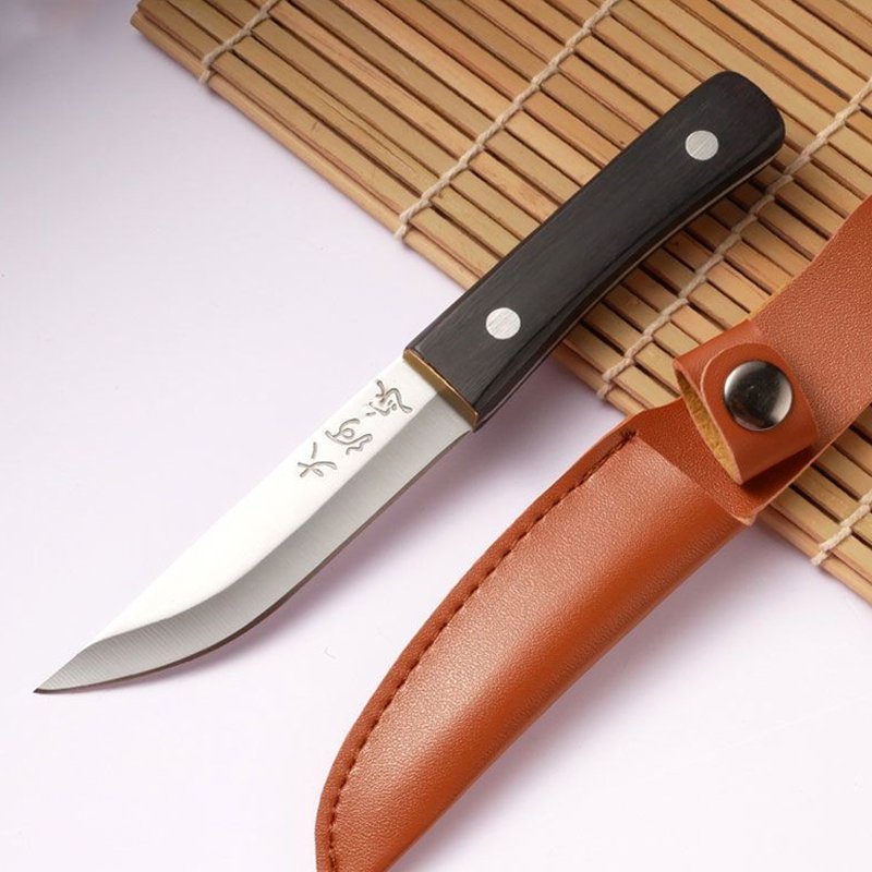 Mongol hands baked a lamb knife to eat meat and stainless steel