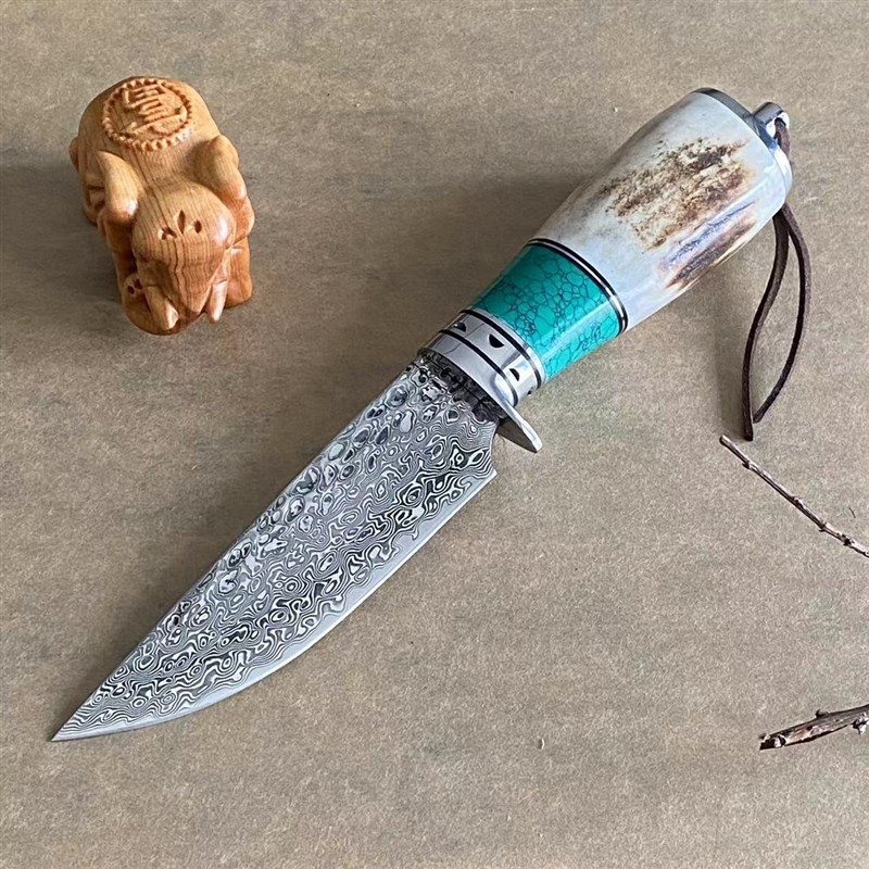 DAMASCUS STEEL OUTSIDERS HANDED A KNIFE WITH A SMALL KNIFE, A FRUIT KNIFE, A HAND KNIFE, A FIELD KNIFE
