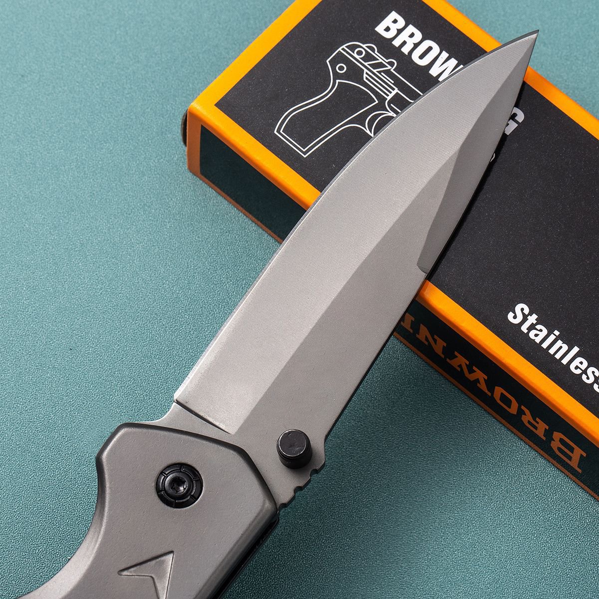An outdoor knife with a cold weapon, a folding knife