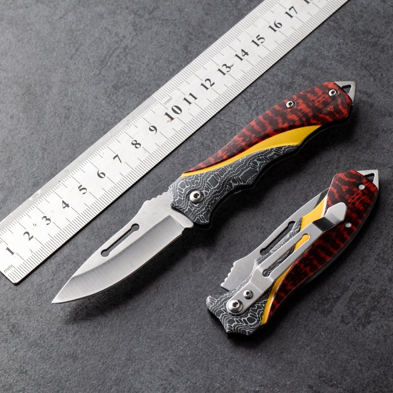 The stainless steel knife, the sharp, sharp folding knife, came with the fruit knife to the camp outside
