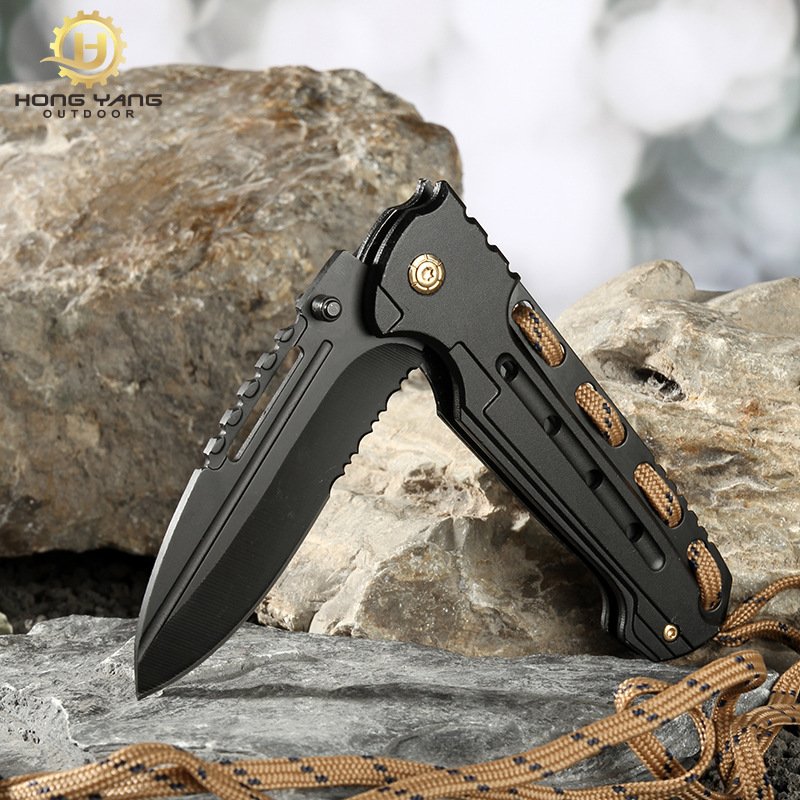 An outdoor Swiss army knife folds a multi-purpose knife, a defensive body, a cold weapon, a portable camper