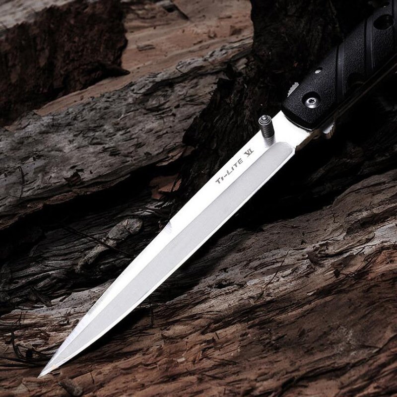 A high-strength knife folding in the outdoors and camping in the field for a sharp fruit knife