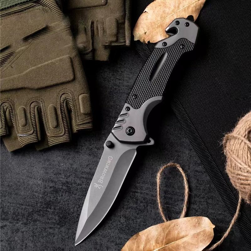 The camping knife was folded with a small knife and a small fruit knife with a mini camper knife