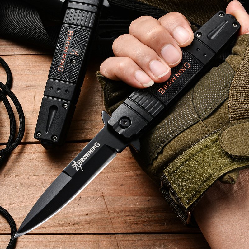Browning's steel camping knife folds, and he goes with his fielding knife and his pocket knife