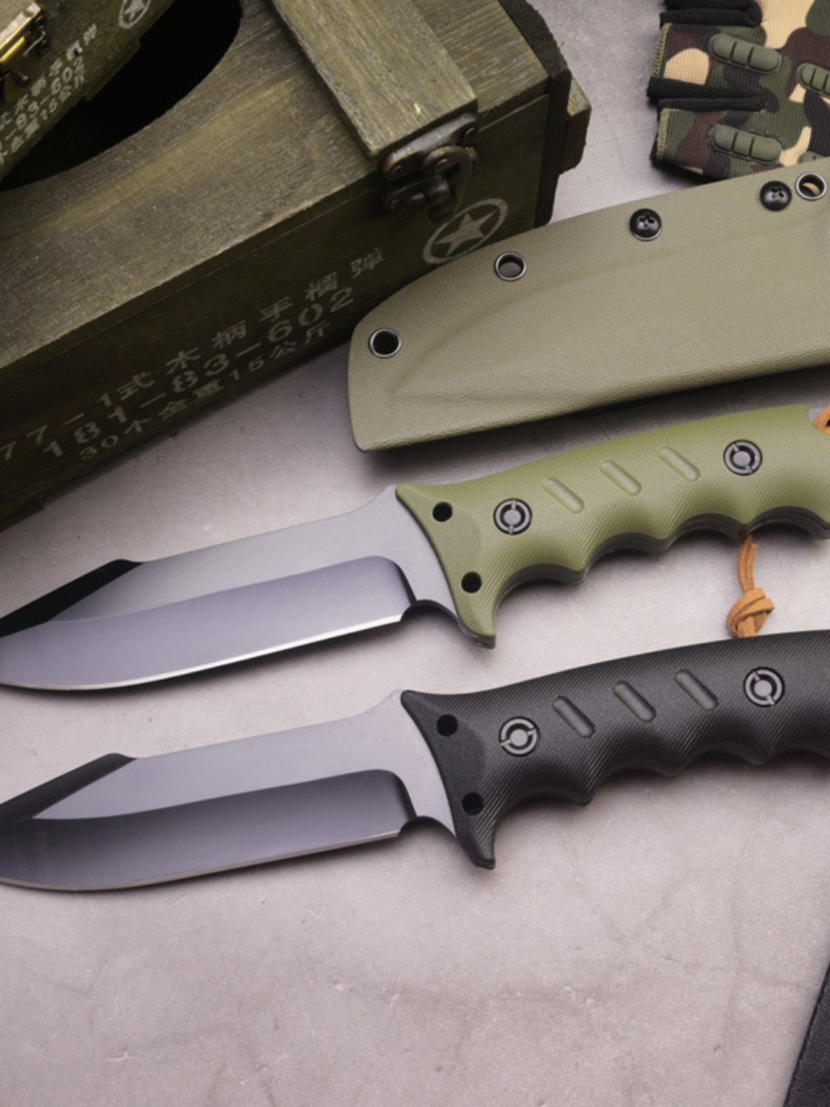 A FIELD CAMPER WITH A K-SHIRT AND AN EDC KNIFE WITH A HAND-HELD KNIFE TO SURVIVE