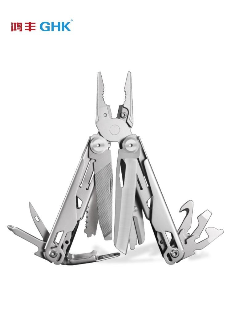 Hung's multi-purpose outdoors with a small wrench and a pair of scissors